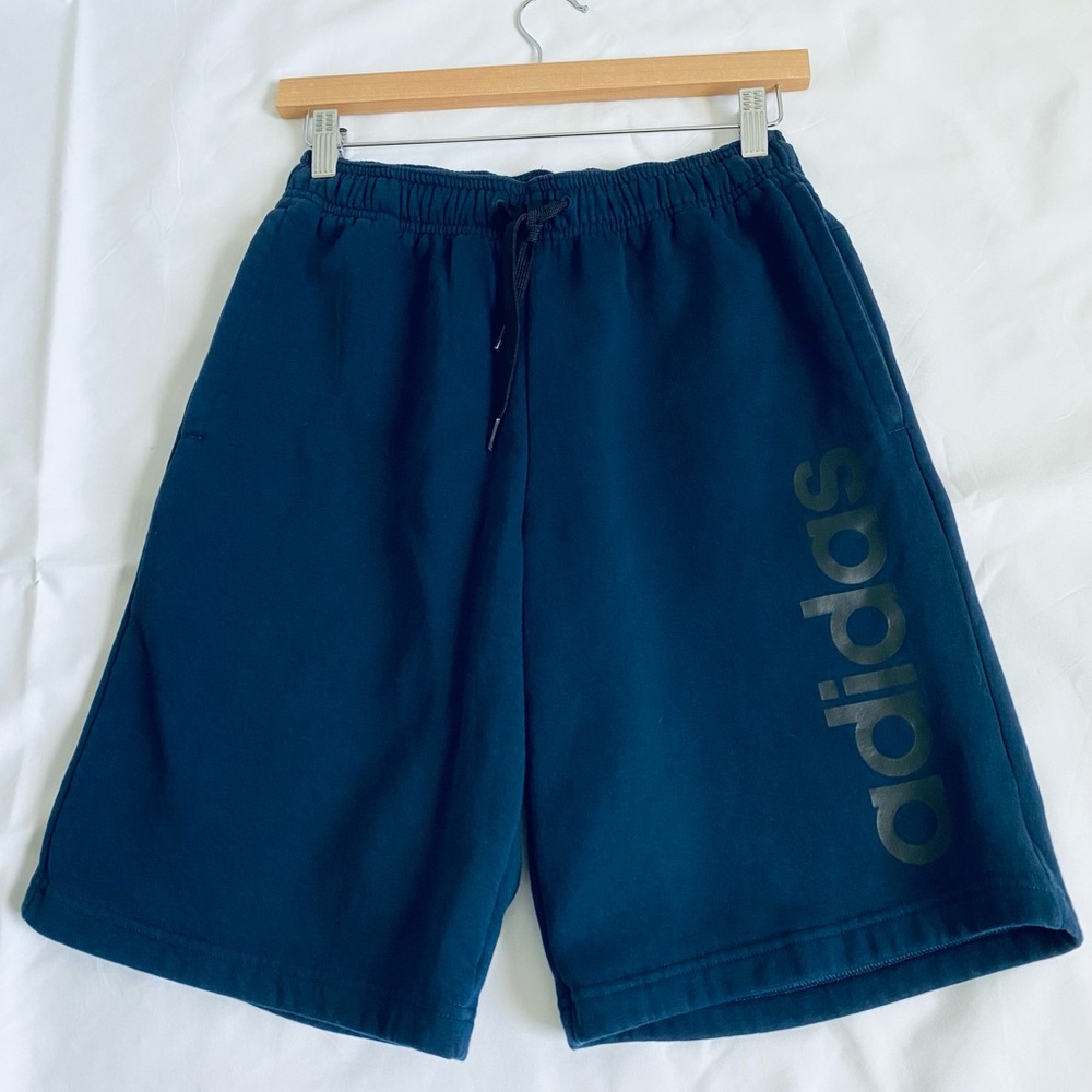 Mens adidas fleece lined shorts with drawstring and pockets.  Size Small.